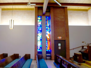 Left: CHRIST IN THE TEMPLE WINDOW; Right: THE NATIVITY WINDOW