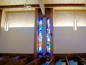 Left: MISSIONS AND PAUL WINDOW; Right: THE CREATION WINDOW