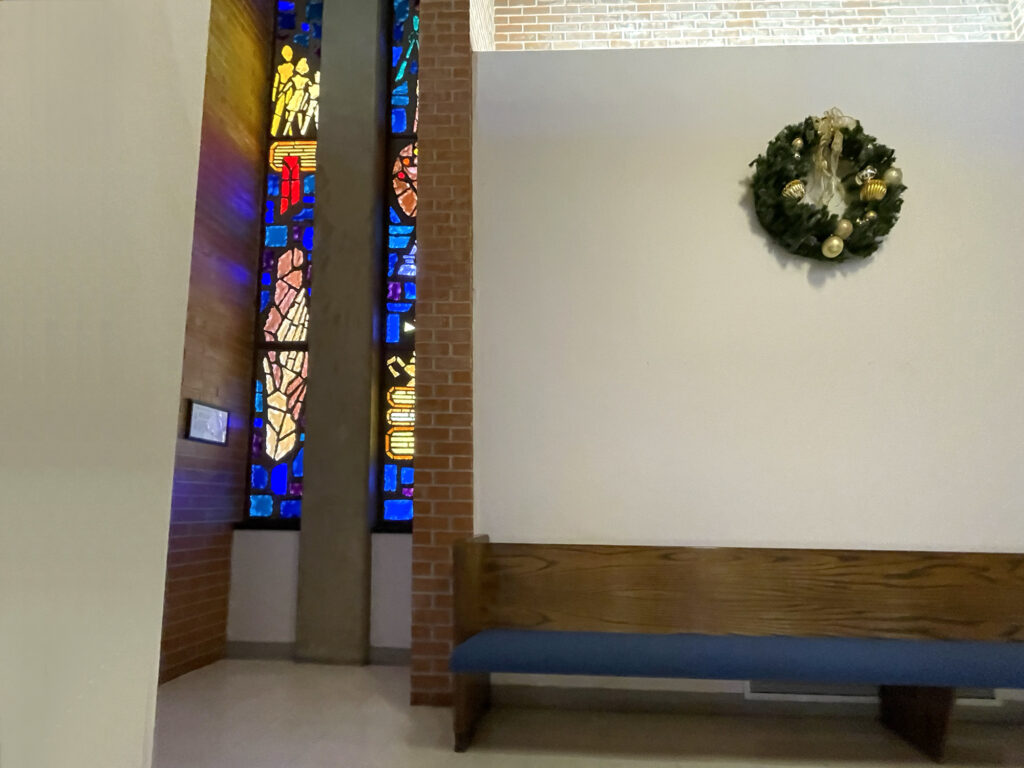Left: FAMILY AND BROTHERHOODWINDOW Right: ARTS AND EDUCATION WINDOW